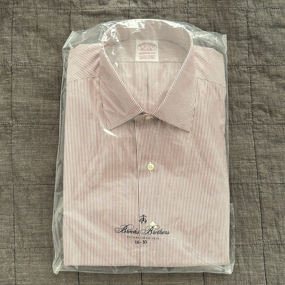 New in package Brooks Brothers Madison fit cotton dress shirt. Maroon stripes.